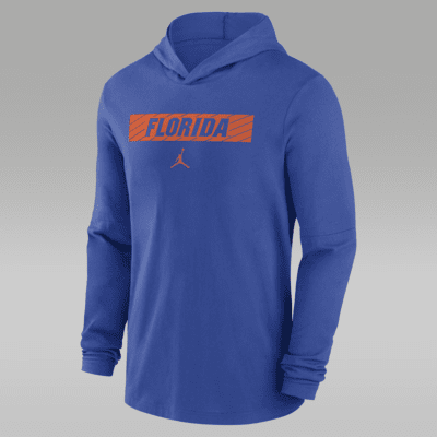 Playera de manga larga universitaria Jordan Dri FIT con gorro para hombre Florida Gators Sideline. Nike